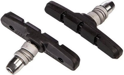 Two bicycle brake shoes on a white background