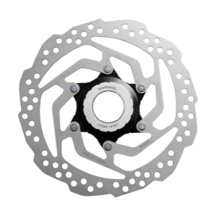 Bicycle disc brake rotor on a white background
