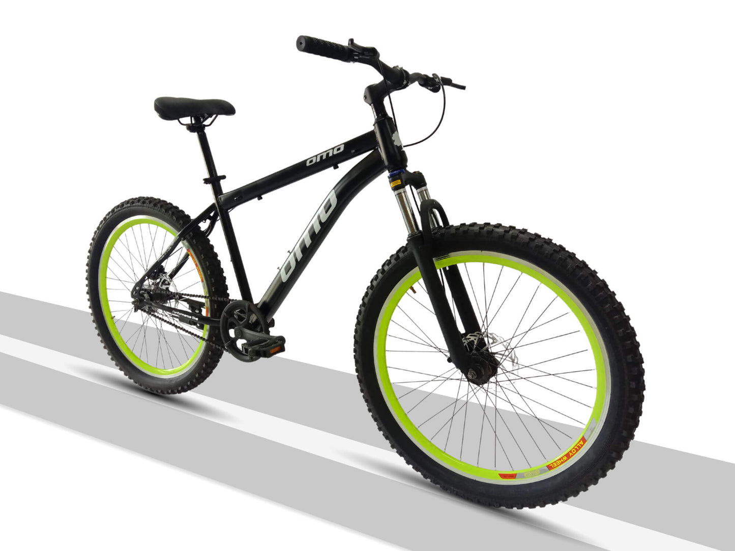 OMO bikes vagator semi FAT steel MTB bike single speed mountain bike with suspension disc brakes in black color green rimside view