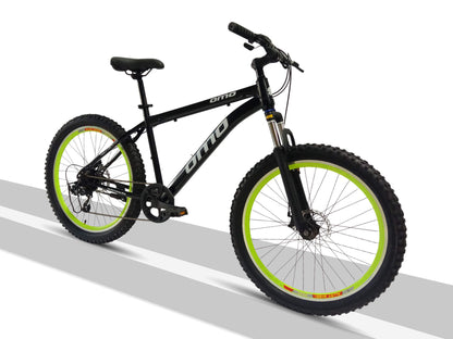 omobikes vagator shimano geared semi fat MTB bike with suspension disc brakes green color front view